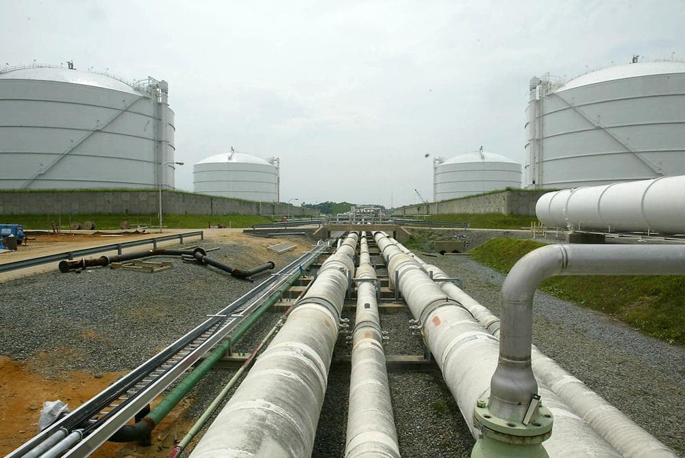This June 13, 2003 file photo shows pipelines running from the offshore docking station to four liquefied natural gas (LNG) tanks at the Dominion Resources Inc. Liquified Natural Gas facility in Cove Point, Md. (Matt Houston/AP File)
