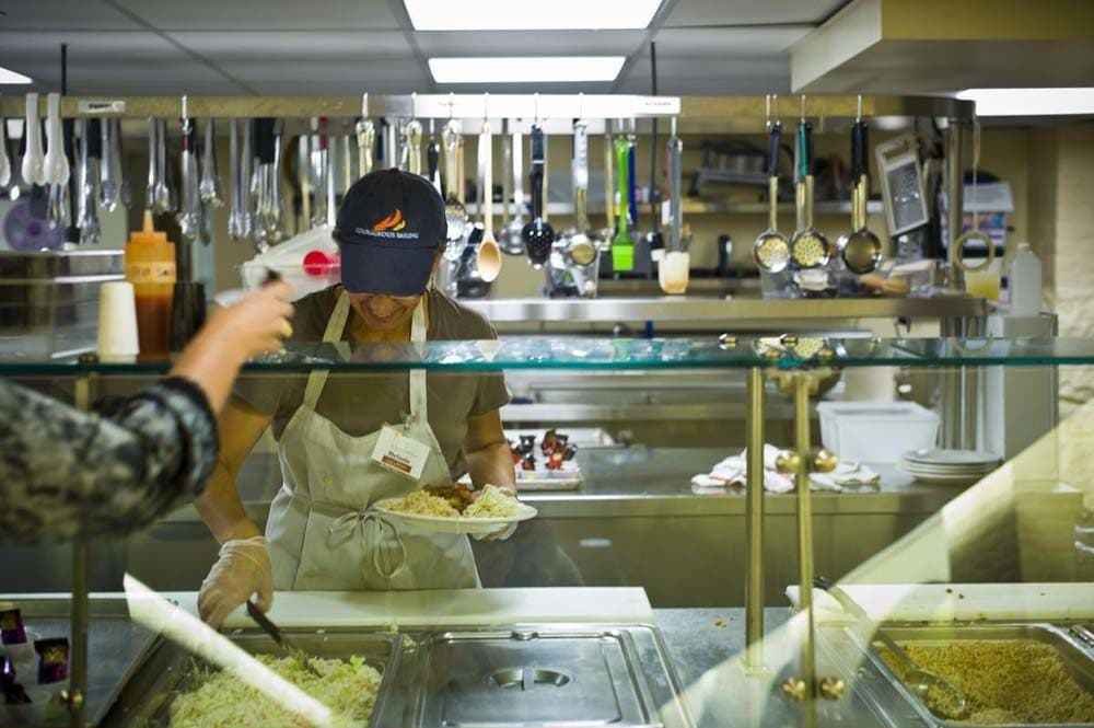 Living in this neighborhood is beyond reach for the women who spend their days at 67 Newbury Street, home of the Women’s Lunch Place, a daytime shelter housed in a church basement. That the Women’s Lunch Place, pictured above, even exists here shows what a study in contrasts the Back Bay is. (Dominick Reuter for WBUR)