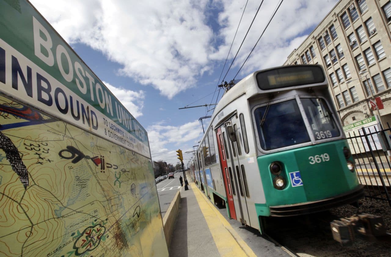 An MBTA train pulls into a stop on Commonweath Avenue near Boston University. (Elise Amendola/AP)