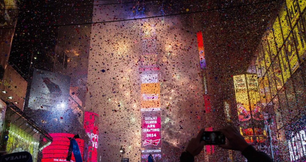 Confetti falls throughout Times Square during the New Years Eve celebration on January 1, 2014 in New York City. Economists are also among those who are optimistic for the new year. (Christopher Gregory/Getty Images)