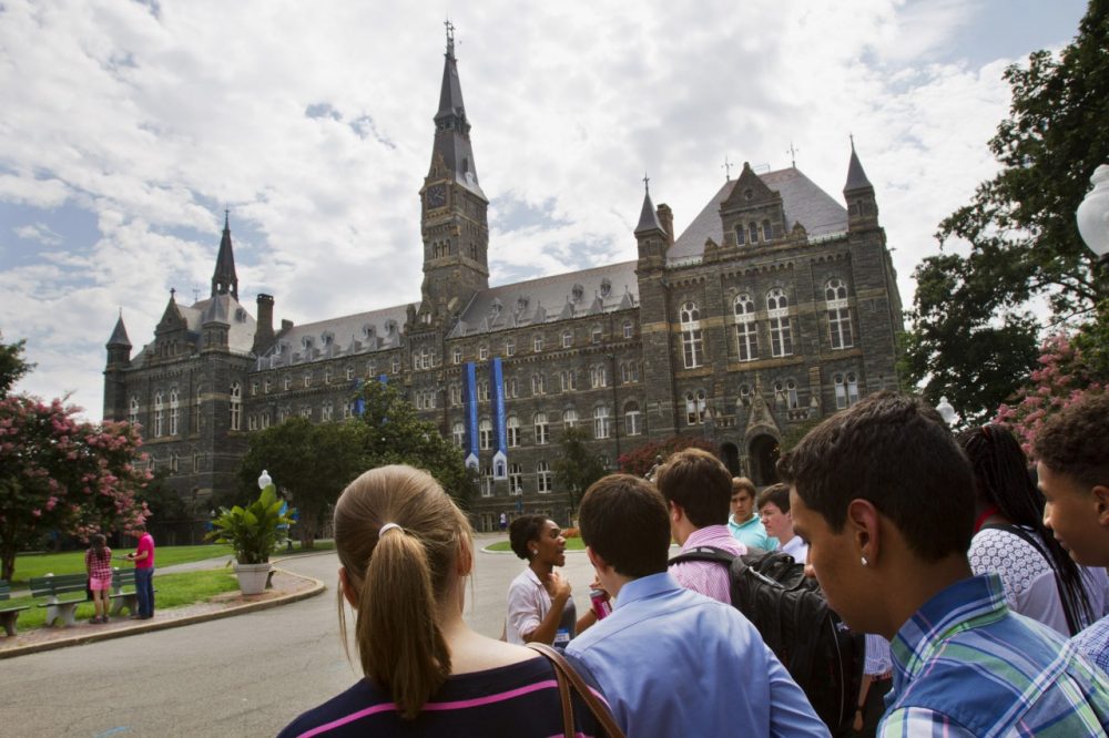 Prospective students tour Georgetown University's campus in Washington, Wednesday, July 10, 2013. (Jacquelyn Martin/AP)