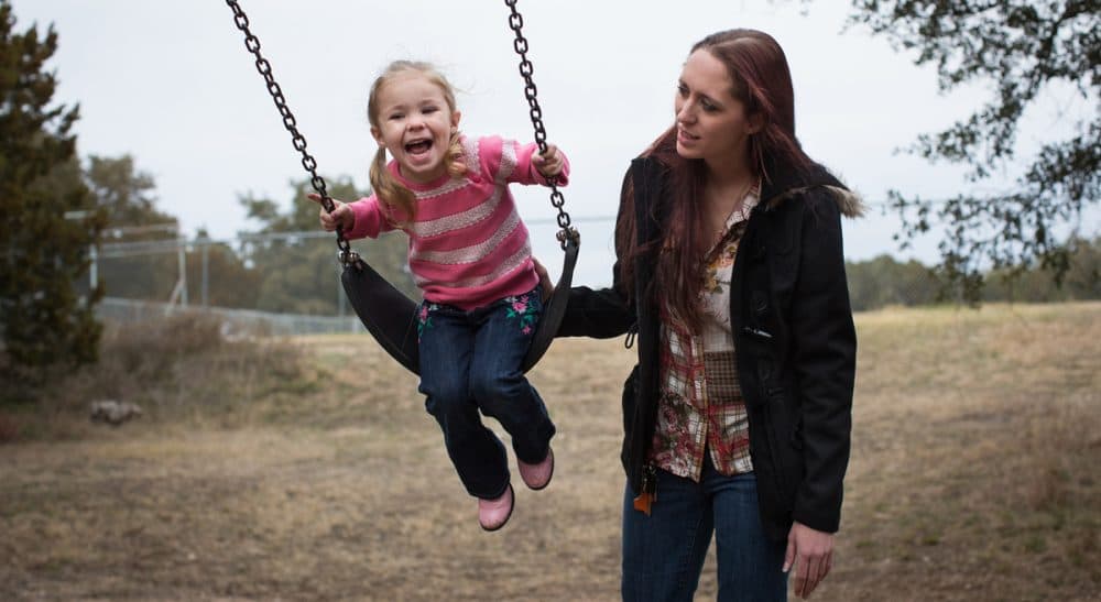 Julie Wittes Schlack: As paternalism comes back into vogue, the struggles for women’s liberation and economic fairness are even more inextricably bound. In this photo, Maggie Barcellano of Lakeway, Texas plays with her 3-year-old daughter, Zoe, on Saturday, Jan. 25, 2014. Barcellano enrolled in the food stamps program to help save up for paramedic training while she works as a home health aide and raises her daughter. Working-age people now make up the majority in U.S. households that rely on food stamps, a switch from a few years ago when children and the elderly were the main recipients. (Tamir Kalifa/AP)