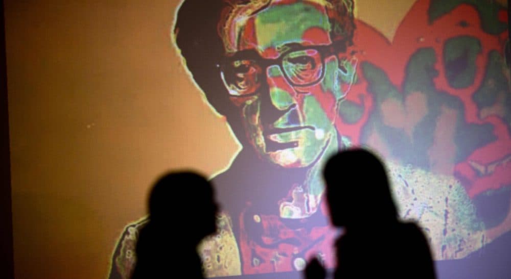 Janna Malamud Smith: Should we care? Yes. But mostly because the public importance of this tale is separate from the people involved. In this photo, an image of Woody Allen is projected on a wall at an art exhibit titled "Queremos tanto a Woody," or "We so love Woody" by Argentine artist Hugo Echarri in Buenos Aires, Argentina, Thursday, Feb. 6, 2014. The exhibit in honor of Allen was inaugurated just days after the artist faced renewed accusations that he molested Dylan Farrow, his then-7-year-old adopted daughter in 1992. (Rodrigo Abd/AP)