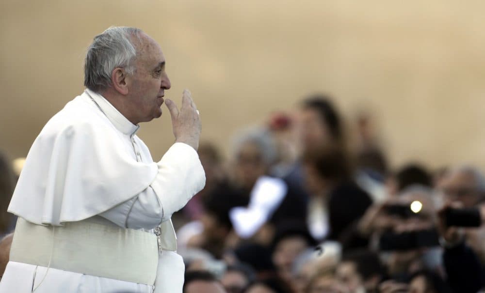 Pope Francis blows a kiss to faithful upon his arrival for his installation Mass at the St. John in Lateran Basilica, in Rome, Sunday, April 7, 2013. Pontiffs are also the bishop of Rome, and a traditional installation ceremony at the basilica formally recognizes that Francis is Rome's bishop as well as the leader of the worldwide Roman Catholic church. (AP)