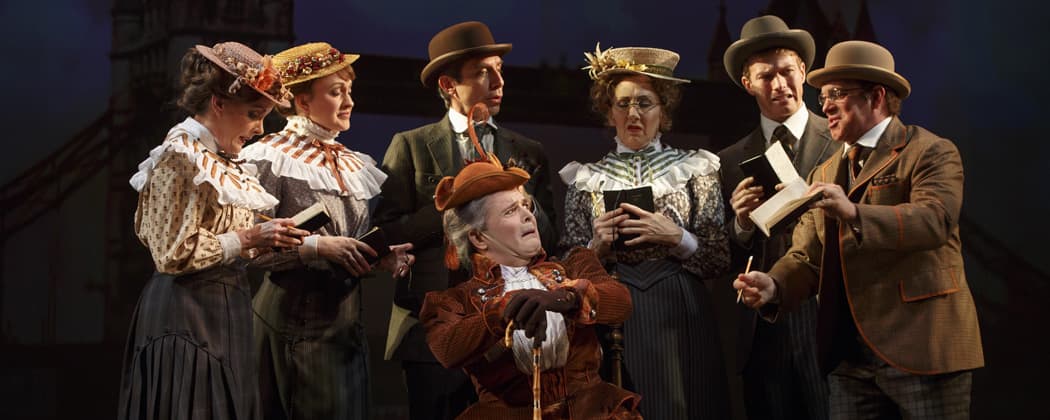 Jefferson Mays , seated center, with the cast during a performance of "A Gentleman's Guide to Love and Murder," at the Walter Kerr Theatre in New York. (The O+M Company/Joan Marcus/AP)