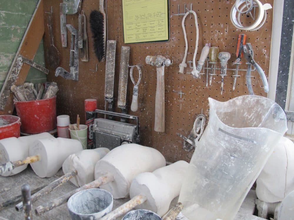 A work bench at United Prosthetics in Dorchester. (Kathleen McNerney/WBUR)