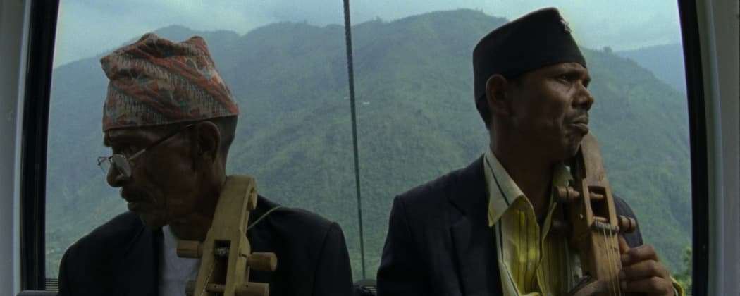 Two religious pilgrims take the cable car to the "Manakamana" temple in Nepal. (Courtesy)
