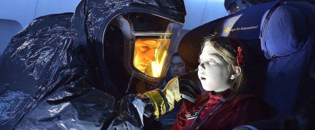 Corey Stoll as Ephraim Goodweather examines one of the victims on a "dead" plane in "The Strain." (Michael Gibson/FX)