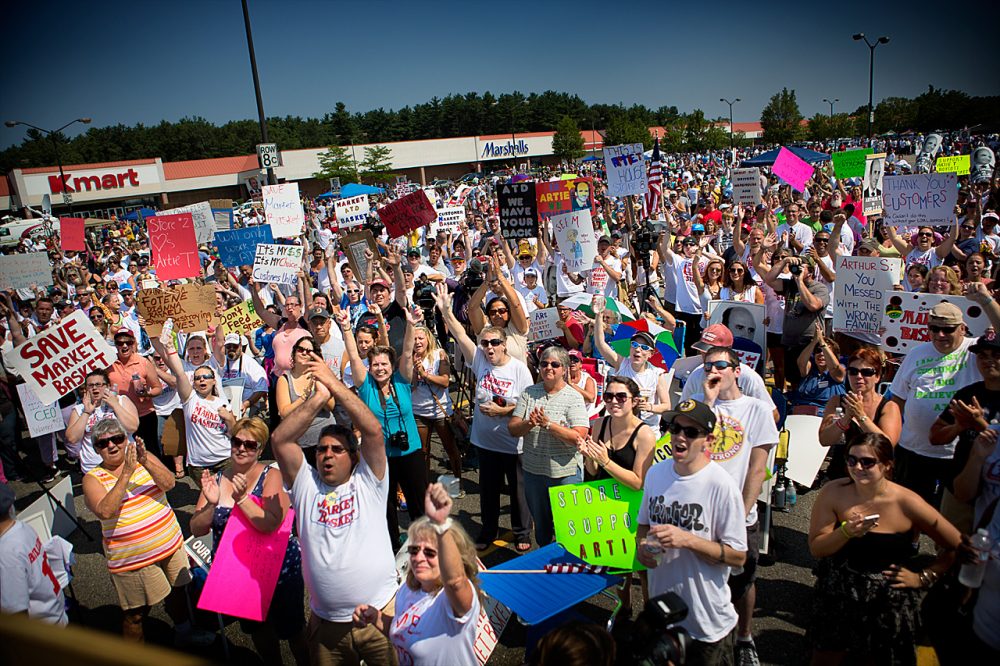 Market Basket employees rally in Tewksbury on Tuesday. (Jesse Costa/WBUR)