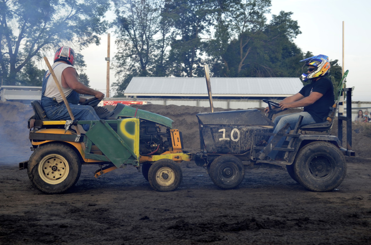 Popping Wheelies And Busting Tires At The Lawnmower Demolition Derby