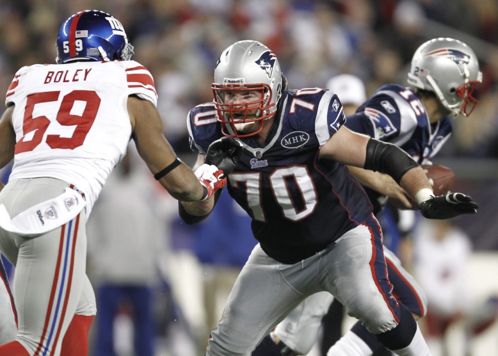 New England Patriots guard Logan Mankins (70) takes on New York Giants outside linebacker Michael Boley in 2011. (Winslow Townson/AP)