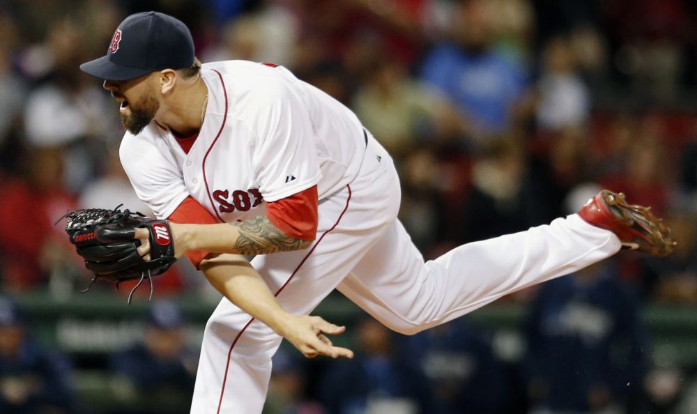Boston Red Sox's Anthony Ranaudo follows through on a pitch during the first inning of a baseball game against the Tampa Bay Rays in Boston, Wednesday night. (Michael Dwyer/AP)