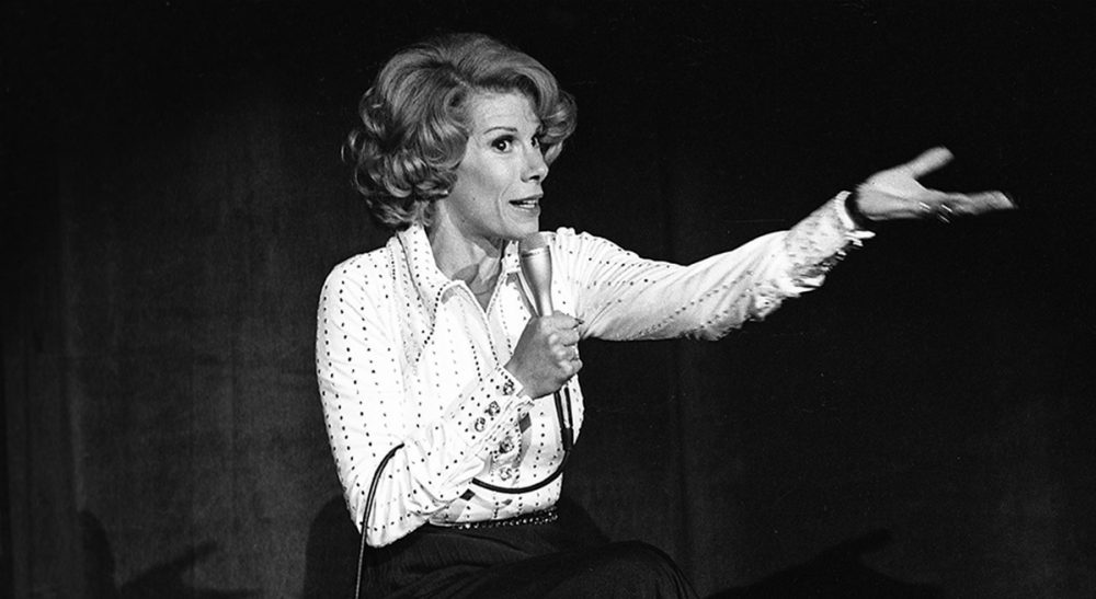Renee Graham: "With Rivers, life, no matter how harsh, cruel or unyielding, was meant to be a punchline." Pictured: Joan Rivers performs at the MGM in Las Vegas, Nev., on Aug. 13, 1975. The raucous, acid-tongued comedian died Thursday, Sept. 4, 2014. She was 81. Rivers was hospitalized Aug. 28, after going into cardiac arrest at a doctor's office. (Las Vegas News Bureau/AP)