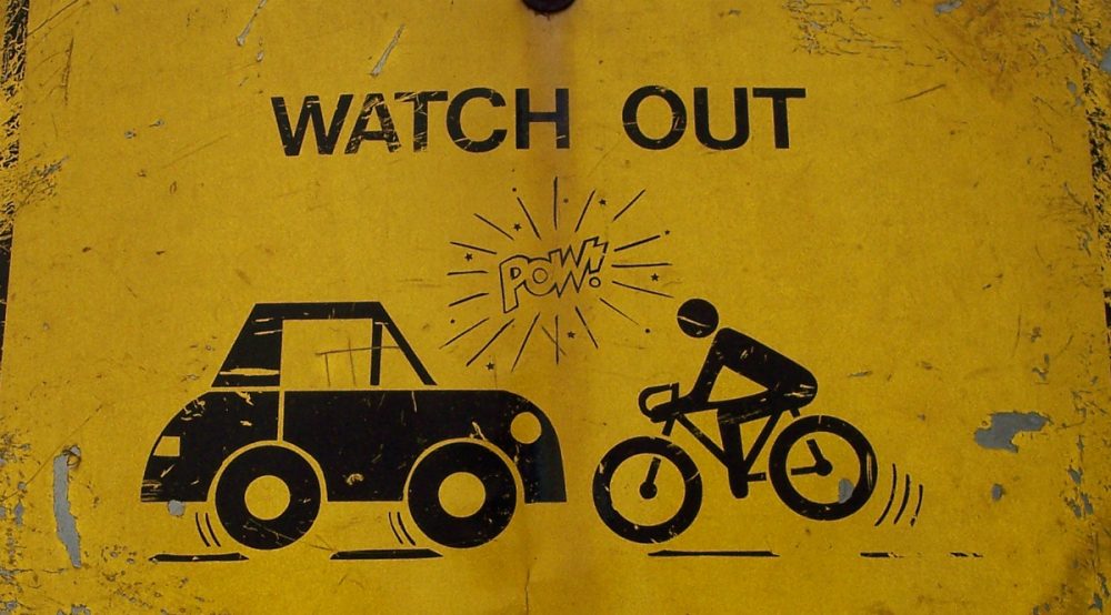 Simon Waxman: "All it means is that, for cyclists, red lights are equivalent to stop signs, and stop signs equivalent to yields." (Kevin Schraer/flickr)