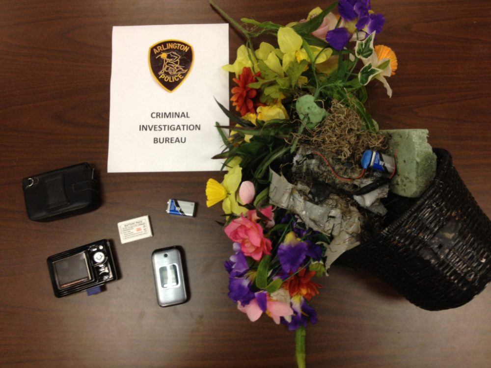 Police say they seized several electronic devices from Hennessey and the cafe's bathroom. (Courtesy Arlington Police Department)