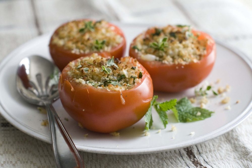 This June 30, 2014 photo shows cheese stuffed tomatoes in Concord, N.H. (AP)