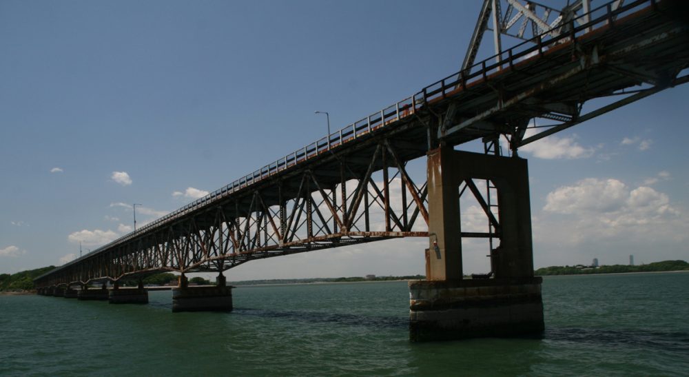 Steve Brown: "The bridge was a metaphor for the connection we on the mainland had with those served by the programs on Long Island: It was shaky. It was tenuous. But at least it was there." Pictured: The Long Island Viaduct spanning Quincy Bay, in the middle of Boston Harbor, 2009. (docsearls/Flickr)