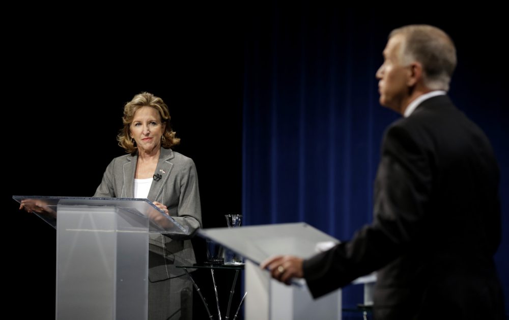 Sen. Kay Hagan, D-N.C., left, and Republican candidate for Senate Thom Tillis participate during a live televised debate at UNC-TV studios in Research Triangle Park, N.C., Wednesday, Sept. 3, 2014. (Gerry Broome/AP)
