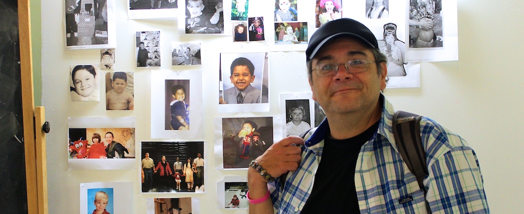 Remo Airaldi at his Harvard Extension School classroom. His kindergarten picture on the far left, second one down from top (Katherine Lam)