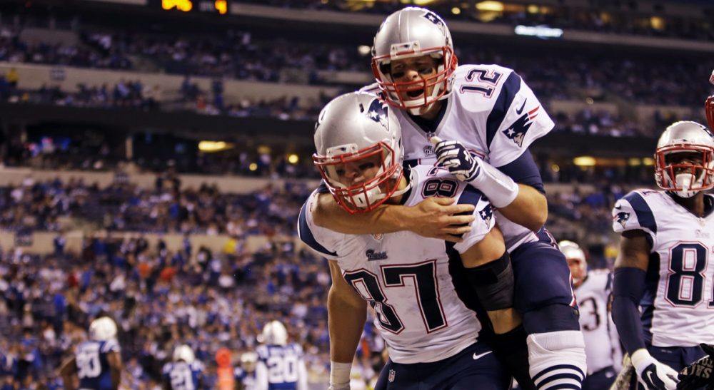 Peter May: A rocky start has given way to smooth sailing for the Pats. Pictured: New England Patriots quarterback Tom Brady jumps on the back of tight end Rob Gronkowski after Gronkowski scored a touchdown against the Indianapolis Colts Sunday, Nov. 16, 2014. (AJ Mast/AP)