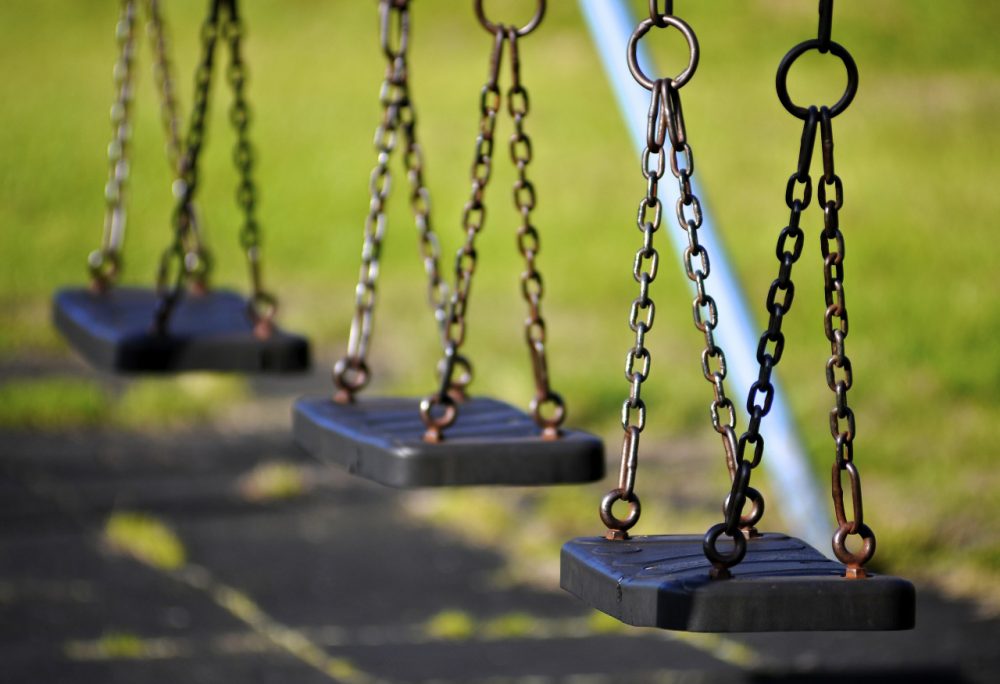 Empty swings (Stuart Herbert/Flickr)