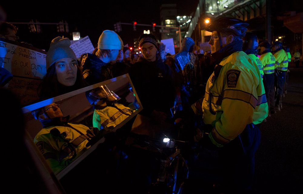 Police block protesters from accessing highway and tunnel ramps in Boston, following the Eric Garner decision.