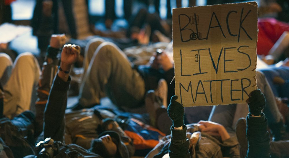 A book on the 1970s summons comparisons to 2015 -- and why we're better off than we think. Pictured: Protestors in downtown Washington during a demonstration against the deaths of two unarmed black men at the hands of white police officers in New York City and Ferguson, Mo. (Cliff Owen/AP)