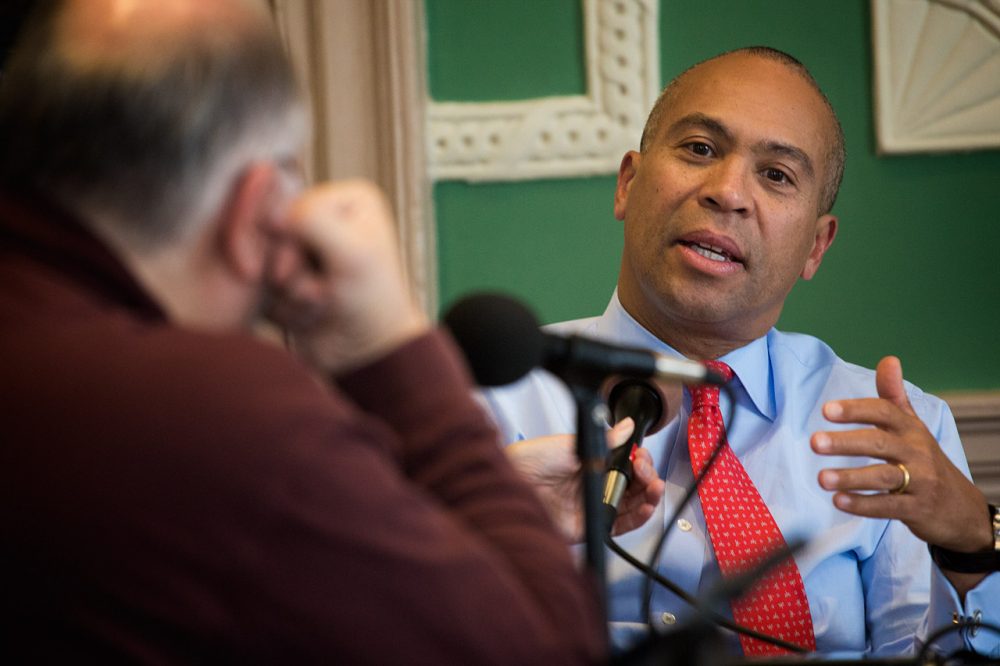 Gov. Deval Patrick with WBUR's Bob Oakes (left). (Jesse Costa/WBUR)