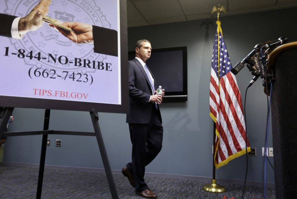 FBI Special Agent in Charge Vincent Lisi, head of the FBI's Boston office, approaches a podium before a news conference Monday. (Steven Senne/AP)
