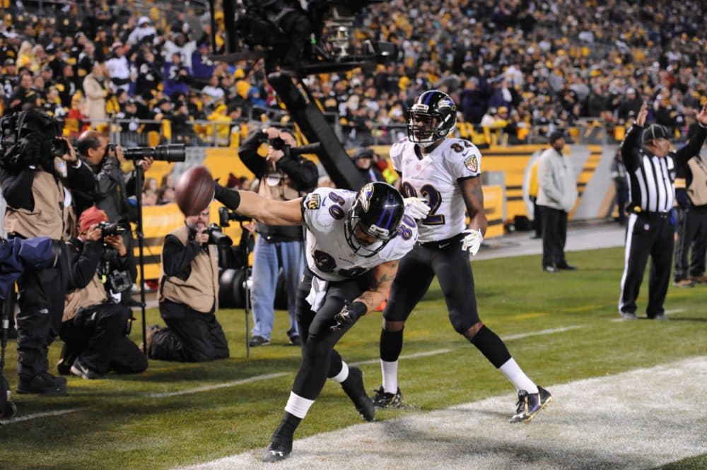 Baltimore tight end Crockett Gillmore (80) celebrates a score in the Ravens' 30-17 Wild Card win over the Steelers. (Don Wright/AP)
