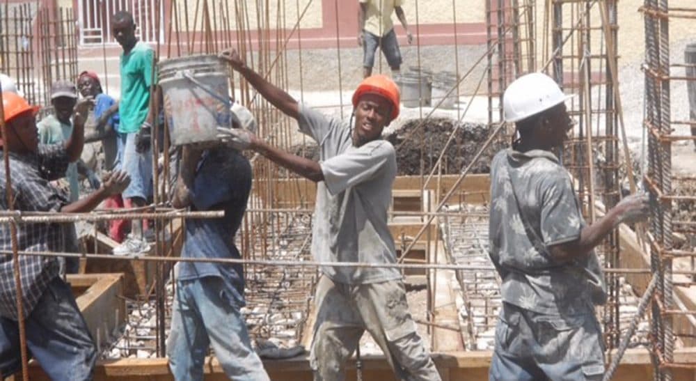 A well-choreographed concrete block brigade building Mission of Hope's school in Grand Goave, Haiti. (Paul Fallon/Courtesy)