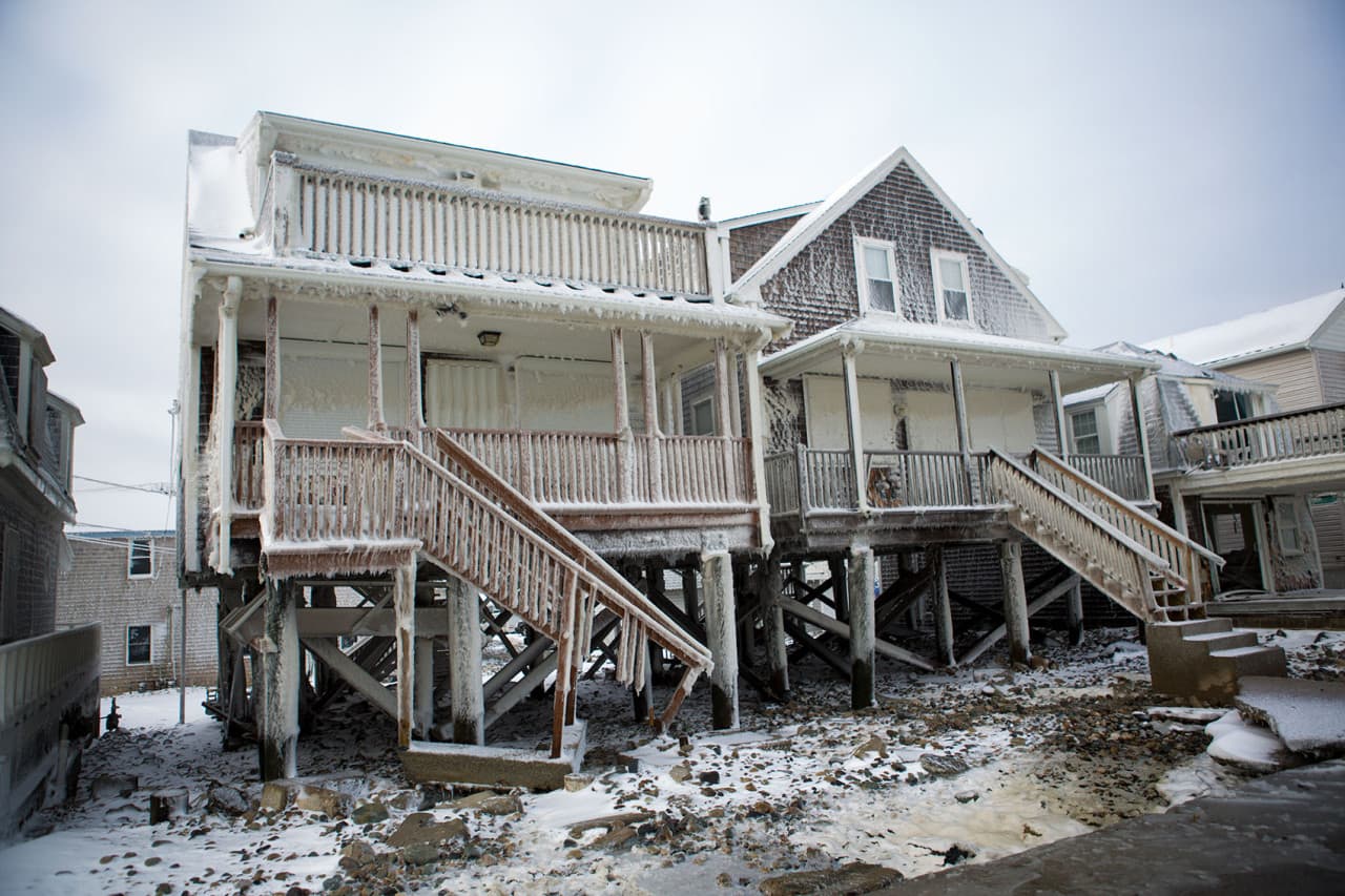 One of the many homes damaged on Brant Rock in Marshfield due to the breach in the seawall. (Jesse Costa/WBUR)