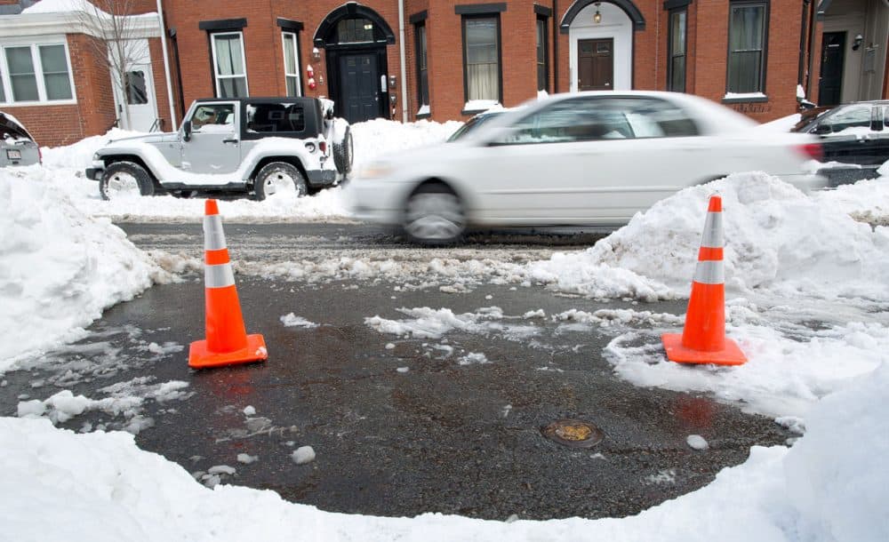 Cones can make a good space saver. These two mark a space on I Street in South Boston.