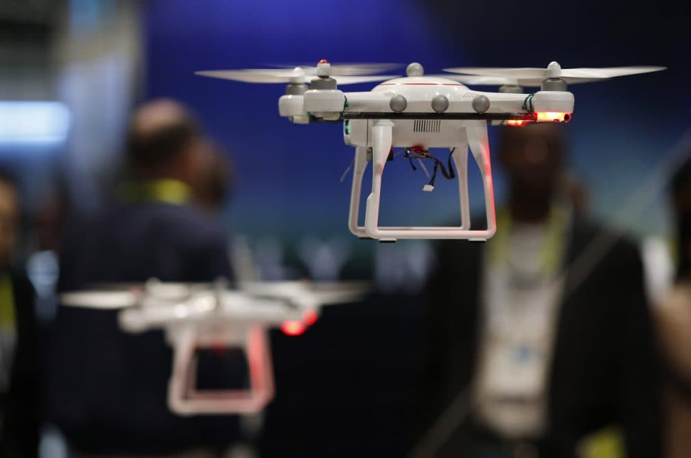 Drones fly at the Autel booth during the International CES Wednesday, Jan. 7, 2015, in Las Vegas. (AP)