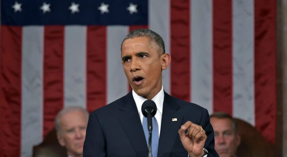President Barack Obama delivers his State of the Union address to a joint session of Congress on Capitol Hill on Tuesday, Jan. 20, 2015, in Washington. Vice President Joe Biden and House Speaker John Boehner of Ohio, listen in the background. (Mandel Ngan/AP)