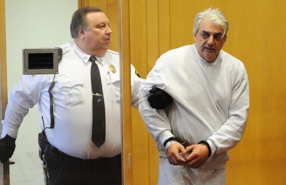 Salvatore Guglielmino, 57, is brought out for his arraignment hearing in Lawrence District Court, Wednesday. (Paul Bilodeau/The Eagle Tribune/Pool)