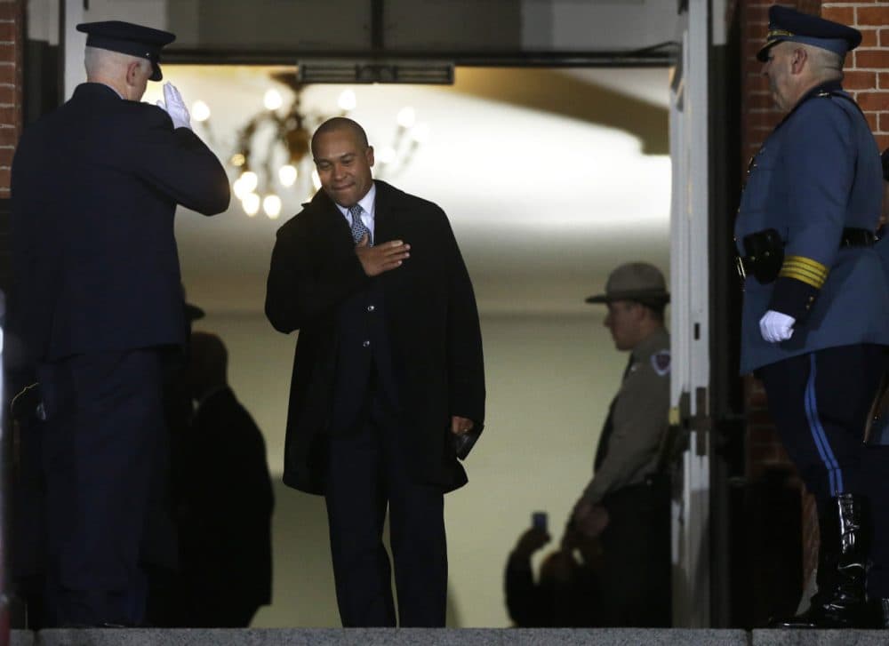 Massachusetts Gov. Deval Patrick departs the State House during the traditional "lone walk" Wednesday. (Steven Senne/AP)