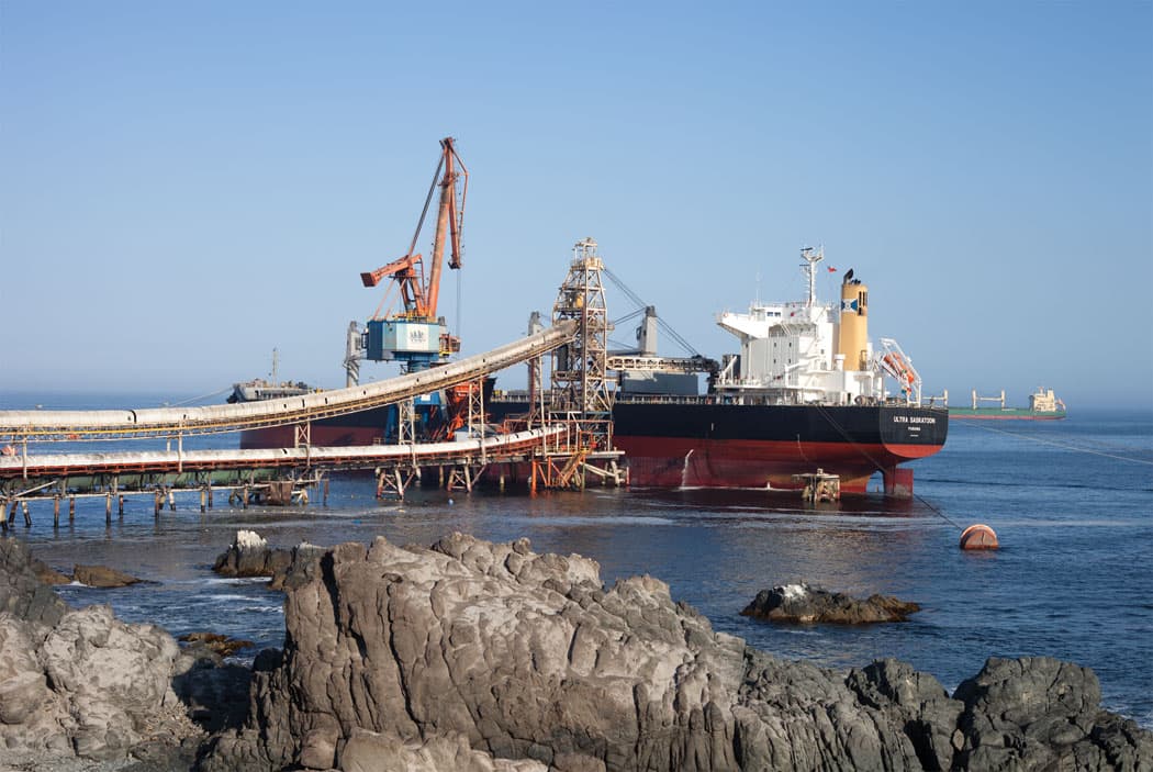 A cargo ship from Panama is loaded with salt along the Pacific coast of Chile. (Allison Cekala)