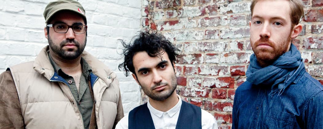 Tigran (center) with the other two members of his trio: Sam Minair, who plays bass, and Arthur Hnatek, on drums. (Maeve Stam/Nonesuch)