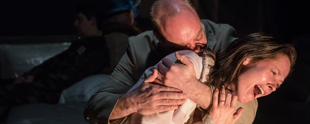 Mel (Tamara Hickey) crying into Ted's (Gabriel Kuttner's) arms in "God's Ear." (Stratton McCrady Photography)