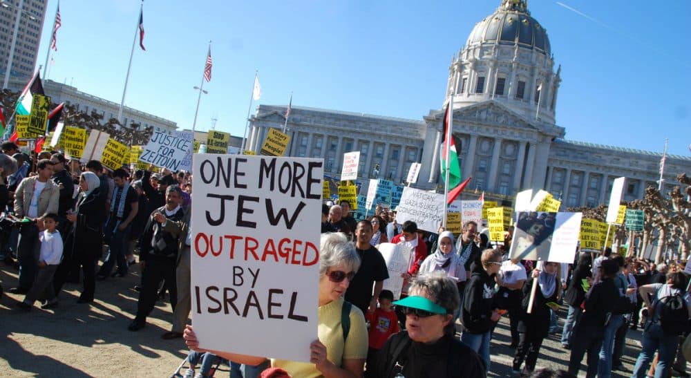 Julie Wittes Schlack: An increasingly polarized American Jewish community must find ways to directly discuss and debate the conflicts in the Middle East -- our identity depends on it. (Steve Rhodes/flickr)