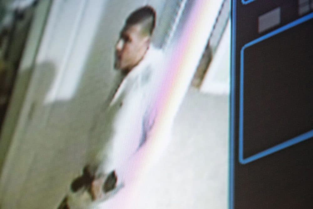 Former New England Patriots football player Aaron Hernandez is seen in footage from his home security system that was played during his murder trial Wednesday. (Dominick Reuter/AP/Pool)