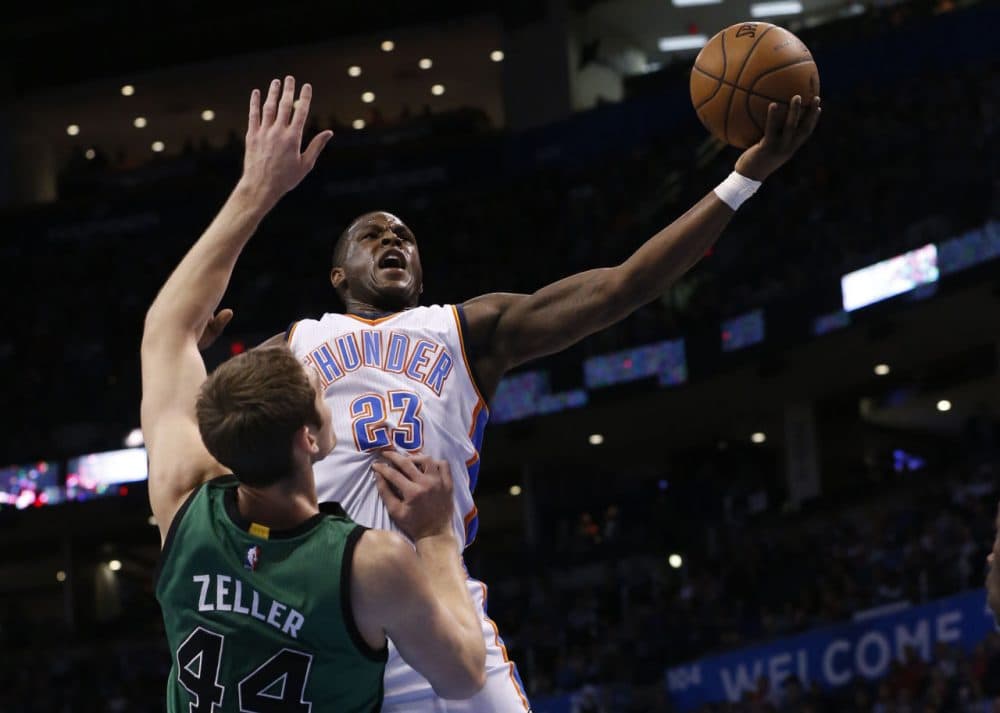 Oklahoma City Thunder guard Dion Waiters (23) shoots as Boston Celtics center Tyler Zeller (44) defends in the first quarter. (AP/Sue Ogrocki)