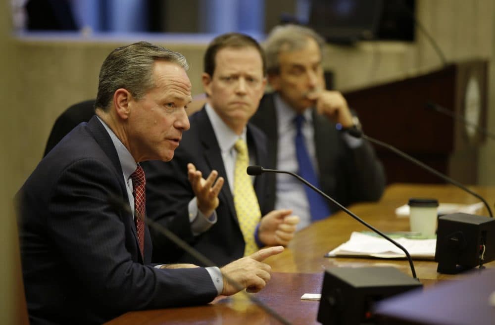 John Fish, chairman of Boston 2024, answers a question Friday during the first Boston City Council meeting on the city's bid to host the 2024 Summer Olympics. (Stephan Savoia/AP)