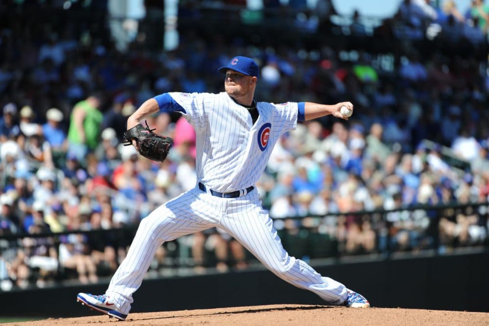 Jon Lester #34 of the Chicago Cubs pitches during a spring training game against the Cincinnati Reds on March 6, 2015 at Sloan Park in Mesa, Arizona. The Reds defeated the Cubs 5-2. (Rich Pilling/Getty Images)