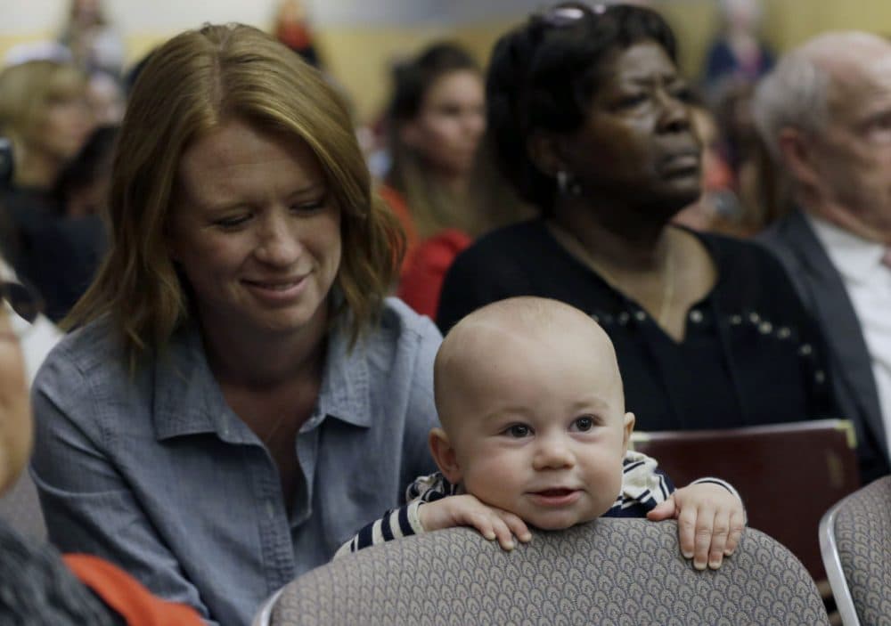 Jennifer Wonnacott, a supporter of a measure requiring California schoolchildren to get vaccinated, keeps an eye on her son, Gavin, at a hearing at the Capitol in Sacramento, Calif., Wednesday, April 8, 2015. Supporters and opponents of the SB277, by Sens. Richard Pan, D-Sacramento and Ben Allen, D-Santa Monica, spoke passionately during the hearing in the Senate Health Committee. (Rich Pedroncelli/AP)