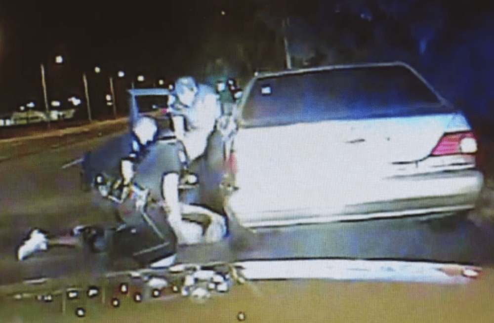 A video released by police shows North Charleston officer Michael Slager using a taser on the motorist after he had been pinned to the ground. (Screenshot)