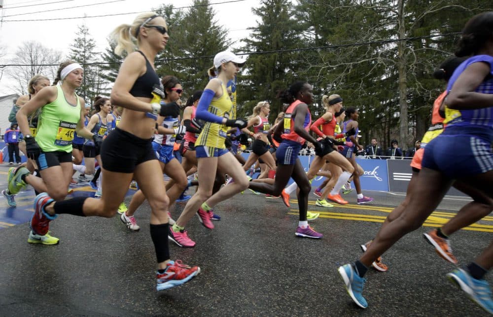 Runners cross the start line in the women's division of Boston Marathon on Monday, April 20, 2015 in Hopkinton, Mass. (Stephan Savoia/AP)