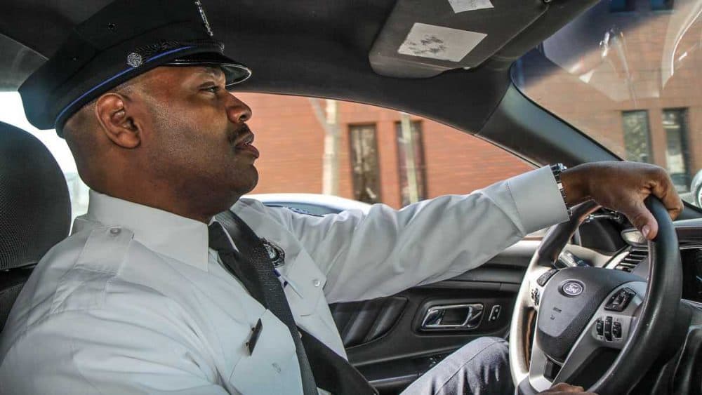 Sgt.Thomas Davis oversees about a dozen or so officers in the18th Police Precinct in West Philadelphia.. (Kimberly Paynter/WHYY)