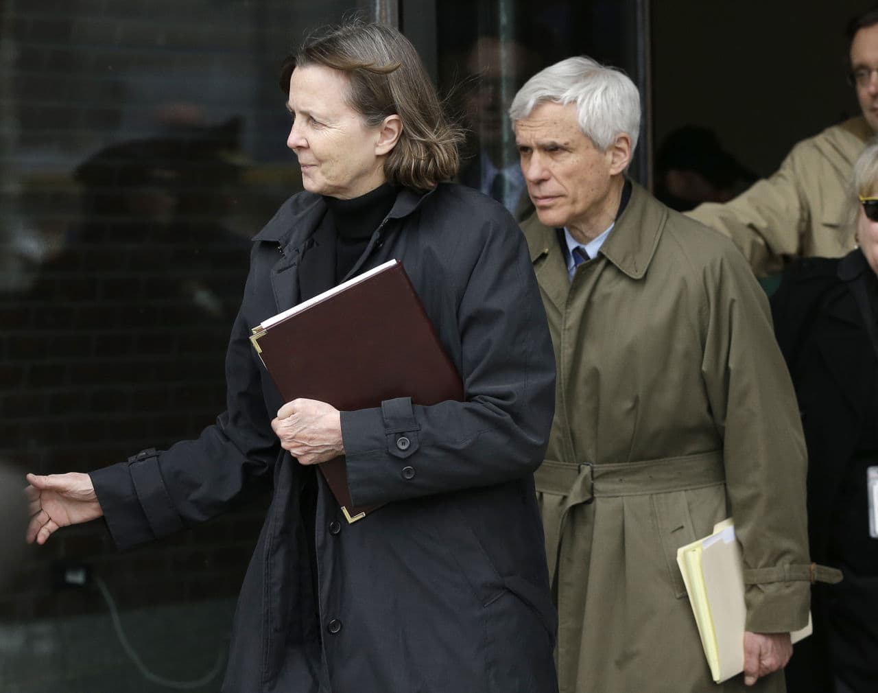 Defense attorneys Judy Clarke, left, and David Bruck leave federal court Wednesday following the verdict. (Steven Senne/AP)